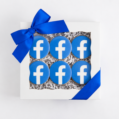 Box of cookies with Facebook logo on a white background