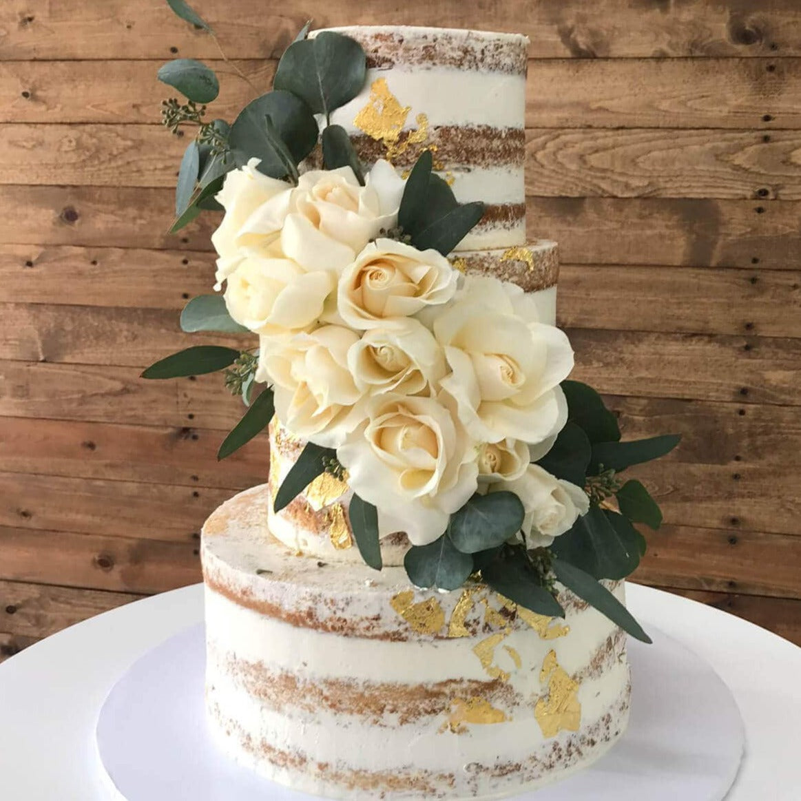 Multi-Tiered Floral Naked Cake - Sweet E's Bake Shop